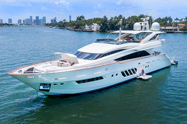 Yacht anchored near Pablo Escobar’s sunken plane, ready for snorkeling.