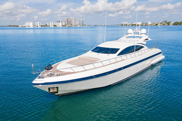 Snorkeling near vibrant coral reefs during a Bahamas yacht charter.